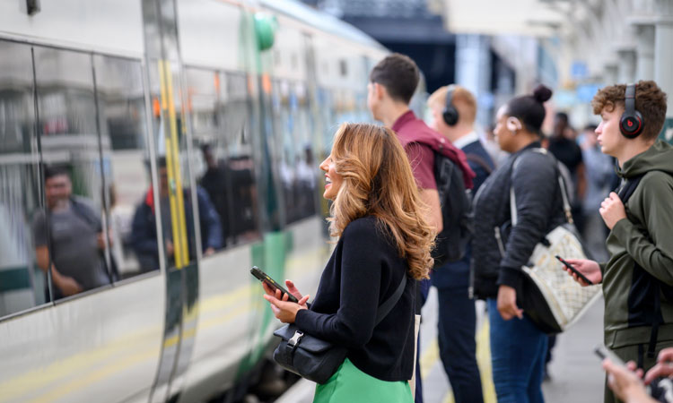 rail passengers at a station platform