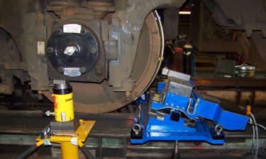 It can quickly be brought to a disabled locomotive to re-profile wheels onsite.