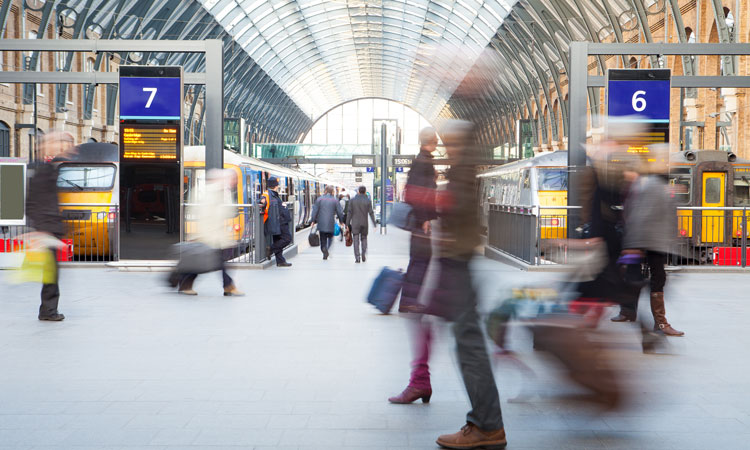 rail passengers at a train station