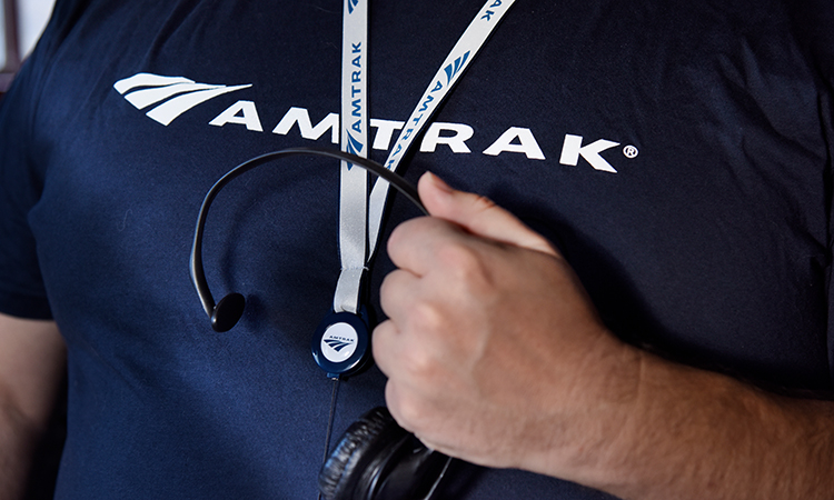 Employee wearing a t-shirt with the Amtrak company logo
