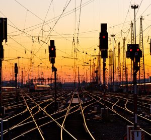 Railway Tracks at a Major Train Station at Sunset.