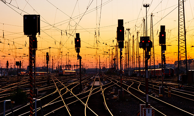 Railway Tracks at a Major Train Station at Sunset.