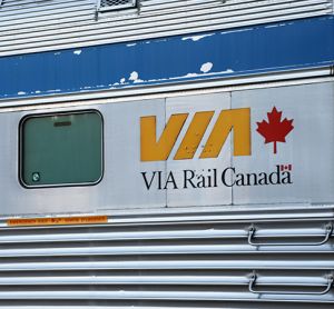 VIA Rail train pulling into a station in Canada