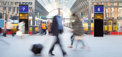 London Train Tube station Blur people movement in rush hour, at King's Cross station,
