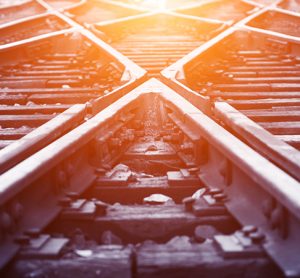 Railway tracks in the sunlight, signifying a new day