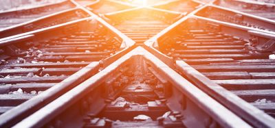 Railway tracks in the sunlight, signifying a new day