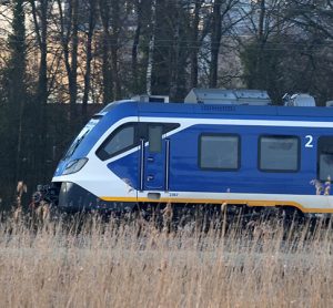 A sprinter train runs along Oude Kene in Hoogeveen, the Netherlands