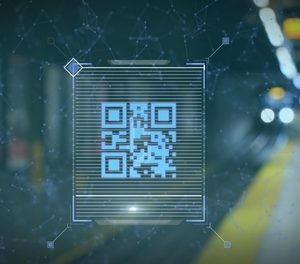 A digital scan of a QR code set against the backdrop of a train station.