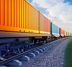 wagon of freight train with containers with a blue sky background