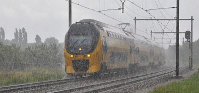 Dutch NS train on a rainy autumn trip in Bunnik (the Netherlands)