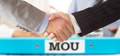 Businessman handshake on mou - memorandum of understanding