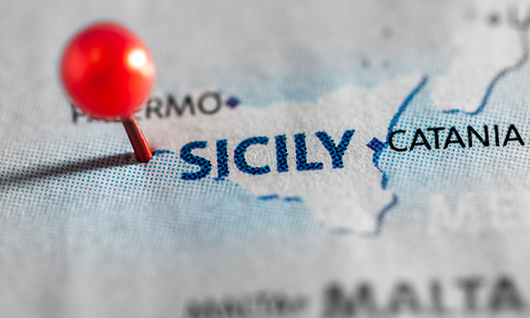 Sicily pinned on a map of Europe.