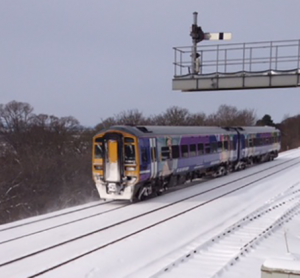 Heavy snow in the UK causes rail travel disruption