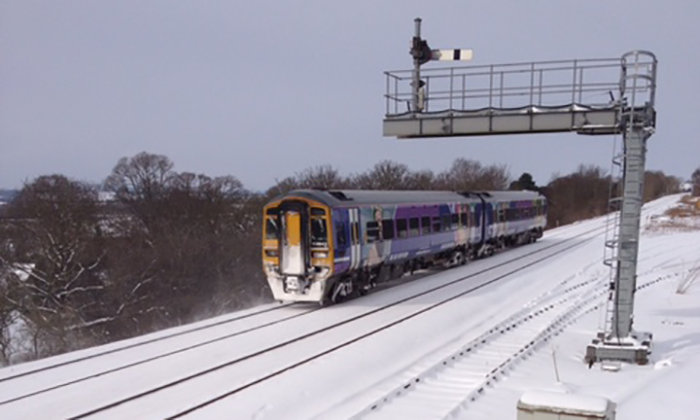 Heavy snow in the UK causes rail travel disruption